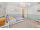 Bright room featuring colorful accents, cozy seating, and charming decor at 1009 Travern Dr, Raleigh, NC 27603