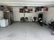 Spacious garage with epoxy floor, storage shelves and ample room for vehicles at 1009 Travern Dr, Raleigh, NC 27603