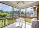 Inviting screened porch with outdoor seating and a beautiful backyard view at 1009 Travern Dr, Raleigh, NC 27603
