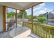 Cozy screened porch with marble table and view of the backyard at 1009 Travern Dr, Raleigh, NC 27603