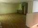 Large bonus room featuring a custom wet bar, perfect for relaxation and entertaining at 101 Cochise Cv, Louisburg, NC 27549