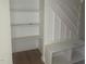 Cozy entryway featuring custom built in shelves and bench at 101 Cochise Cv, Louisburg, NC 27549