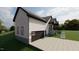 Modern home with attached garage and landscaped front yard at 101 Cochise Cv, Louisburg, NC 27549