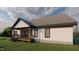 This cozy home features a welcoming back porch, perfect for relaxing outdoors at 101 Cochise Cv, Louisburg, NC 27549