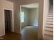 Bright living room with beautiful flooring, providing ample space for relaxation and entertainment at 101 Cochise Cv, Louisburg, NC 27549