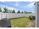 Well-maintained backyard featuring a privacy fence and lawn area, ideal for relaxation and outdoor activities at 1011 Canary Pepper Dr, Durham, NC 27713
