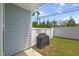 Cozy patio in fenced backyard, perfect for outdoor dining and entertaining at 1011 Canary Pepper Dr, Durham, NC 27713