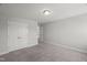 A carpeted bedroom featuring neutral walls and a closet at 1011 Canary Pepper Dr, Durham, NC 27713