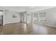 Spacious dining area with plenty of natural light, modern light fixture, and wood floors at 1011 Canary Pepper Dr, Durham, NC 27713