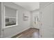 Bright entryway featuring wood floors and a large window at 1011 Canary Pepper Dr, Durham, NC 27713