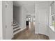 Inviting entryway with wood floors offers a view of the staircase at 1011 Canary Pepper Dr, Durham, NC 27713