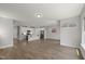 Open-concept living space with a seamless flow between the kitchen and dining area at 1011 Canary Pepper Dr, Durham, NC 27713