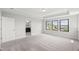 Bright main bedroom with plush carpet and an en-suite bathroom at 1011 Canary Pepper Dr, Durham, NC 27713