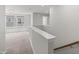 Upstairs hallway featuring carpet flooring and natural light at 1011 Canary Pepper Dr, Durham, NC 27713