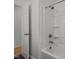 A clean and functional shower and tub combination is visible through the open door at 1040 Mills St, Raleigh, NC 27608