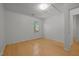 This bedroom has wood floors and a window for lots of natural light at 1040 Mills St, Raleigh, NC 27608
