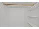 A walk-in closet has a clothes rod and some shelving at 1040 Mills St, Raleigh, NC 27608