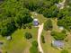 Aerial view of the property, showcasing the house, pool, and surrounding greenery at 105 Kirkland Ct, Archer Lodge, NC 27527