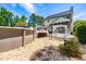 Well-maintained backyard with an above-ground pool, a deck, and a cozy swing at 105 Kirkland Ct, Archer Lodge, NC 27527