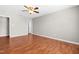Spacious bedroom with hardwood floors and a ceiling fan at 105 Kirkland Ct, Archer Lodge, NC 27527