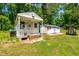 Multiple storage shed buildings in backyard with an attached utility pole at 105 Kirkland Ct, Archer Lodge, NC 27527