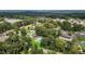 Community aerial view showcasing lush greenery, community pool, and nearby amenities at 11 Stone Village, Durham, NC 27704
