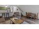 Inviting living space with seamless flow to the kitchen, dining area, and wood floors at 11 Stone Village, Durham, NC 27704