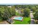 Aerial view of a community pool surrounded by lush greenery, providing a serene recreational space at 11 Stone Village, Durham, NC 27704