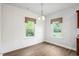 Cozy dining area with natural light and view of the backyard at 11 Woodwater Cir, Lillington, NC 27546