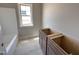 Bathroom featuring a tub, vanity, and window, providing a bright and functional space to get ready each day at 112 Royal Ave, Selma, NC 27576