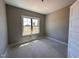 Comfortable bedroom with a window, offering a quiet and relaxing space for sleep or study at 112 Royal Ave, Selma, NC 27576