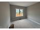 Cozy bedroom with natural light from a large window at 112 Royal Ave, Selma, NC 27576