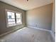 Cozy bedroom with a bright window, offering a comfortable space for relaxation and rest at 112 Royal Ave, Selma, NC 27576