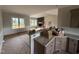 Inviting living area featuring a stone fireplace, large windows and granite countertop at 112 Royal Ave, Selma, NC 27576