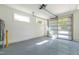 Well-lit two-car garage with epoxy floor and large windows in the garage door at 1124 Upchurch St, Raleigh, NC 27610