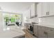 Kitchen with lots of light, an island and stainless steel appliances at 1124 Upchurch St, Raleigh, NC 27610