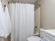 This bathroom features a shower-tub combo and white towels at 113 Weatherstone Dr # B, Chapel Hill, NC 27514