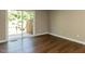 Bright living space with sliding glass doors opening to an outdoor patio at 113 Weatherstone Dr # B, Chapel Hill, NC 27514
