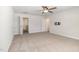 Bedroom with a ceiling fan and two entrances on different walls at `120 Red Hawk Pl, Smithfield, NC 27577