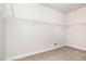 Walk-in closet providing ample space for organizing clothes, shoes, and accessories at `120 Red Hawk Pl, Smithfield, NC 27577
