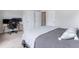 Bright bedroom featuring a work space, neutral walls, light floors, and ample closet space at 1223 Brown Velvet Ln, Apex, NC 27523