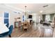 Open dining room area next to living room with lots of natural light at 1223 Brown Velvet Ln, Apex, NC 27523