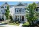 Charming two-story home with a balcony, landscaped yard, and inviting curb appeal at 1223 Brown Velvet Ln, Apex, NC 27523
