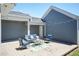 Outdoor patio with chairs and sofa, perfect for entertaining guests at 1223 Brown Velvet Ln, Apex, NC 27523
