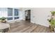 Bright sunroom with wood flooring, lots of natural light, and access to the backyard at 1223 Brown Velvet Ln, Apex, NC 27523