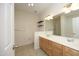 Bright bathroom with dual sink vanity and neutral flooring at 12306 Mossgreen St, Raleigh, NC 27614