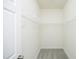 Walk-in closet has carpet flooring and wire shelving at 12306 Mossgreen St, Raleigh, NC 27614