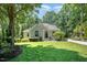 Inviting single-story home with well-maintained landscaping and a charming facade at 12733 Pamplona Dr, Wake Forest, NC 27587