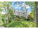 Charming house nestled amidst lush greenery with brick chimneys and well-manicured landscaping at 1314 Glendale Ave, Durham, NC 27701