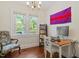 Bright office with a dedicated workspace and views of the outdoors at 1314 Glendale Ave, Durham, NC 27701